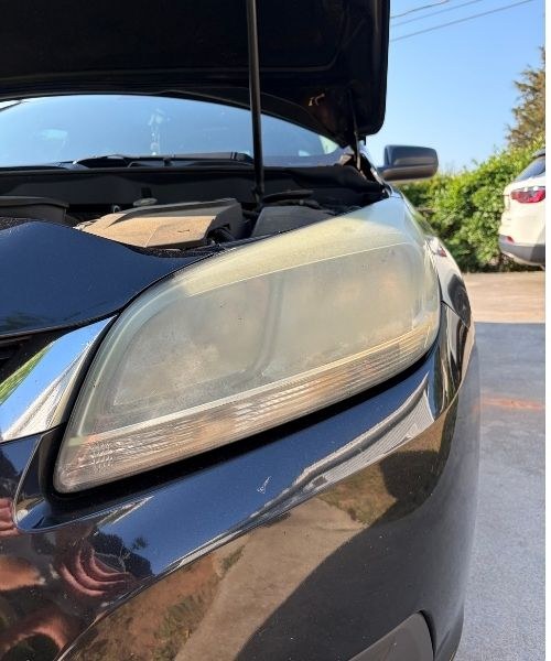 Cloudy, oxidized headlight before restoration